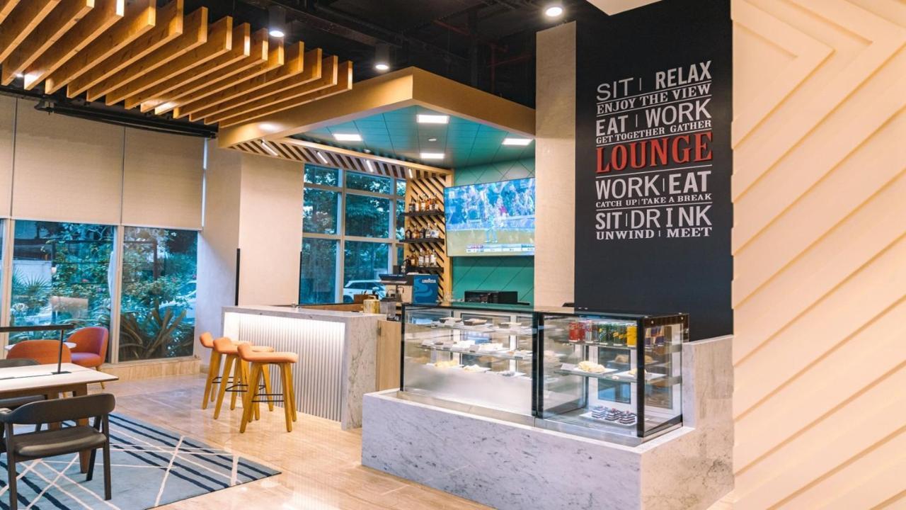 Holiday Inn Bengaluru Racecourse By Ihg Exterior photo The Lounge at KLIA